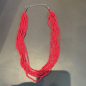 7 strand beaded necklace in red coral